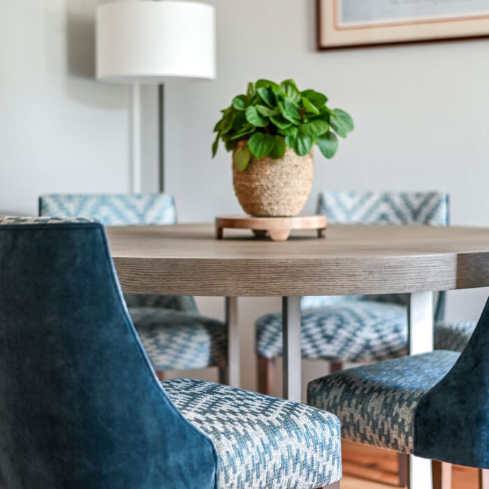 Smoked oak dining table and bespoke dining chairs by Jacober Interiors