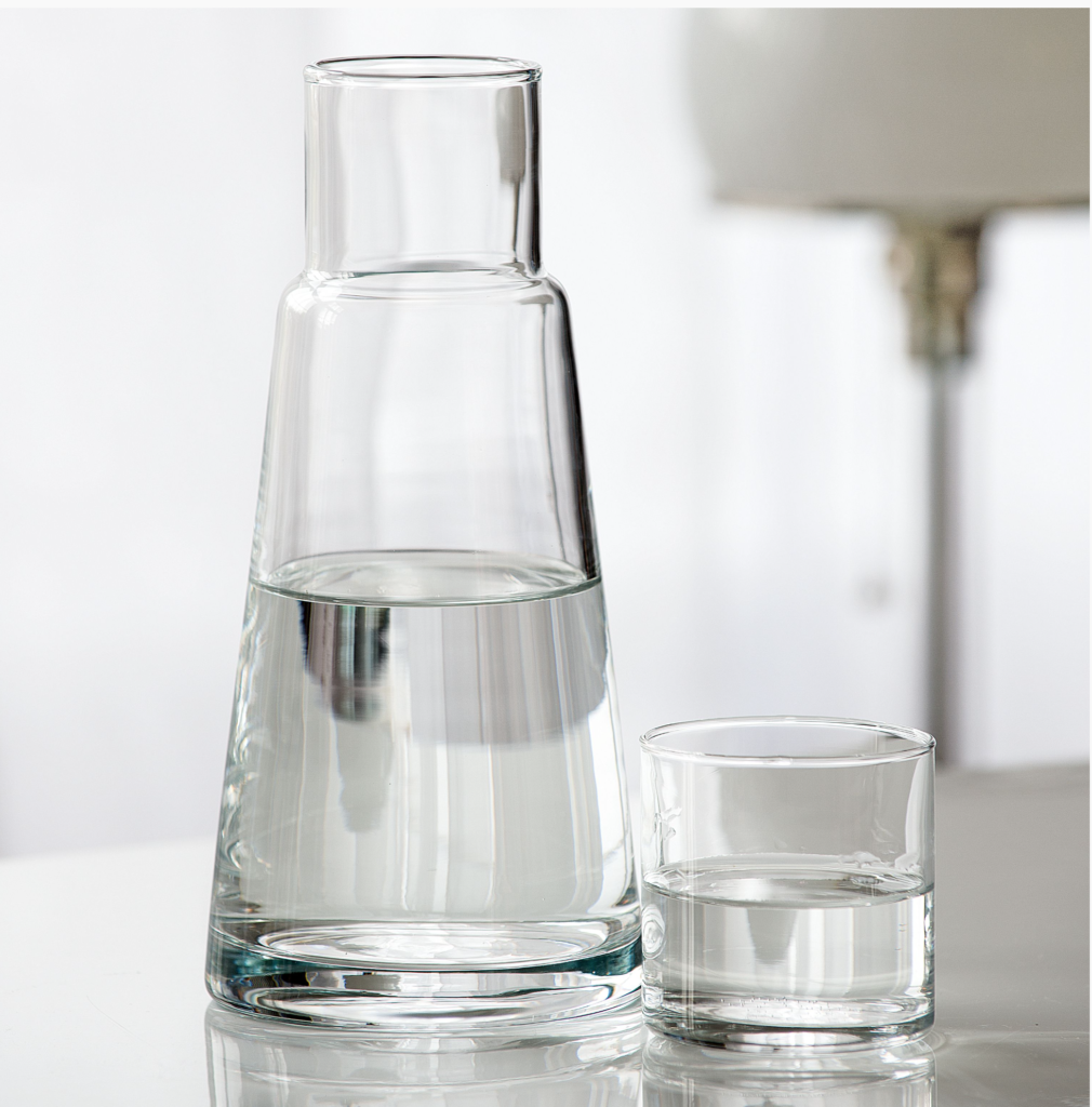 Guest room bedside carafe and glass set